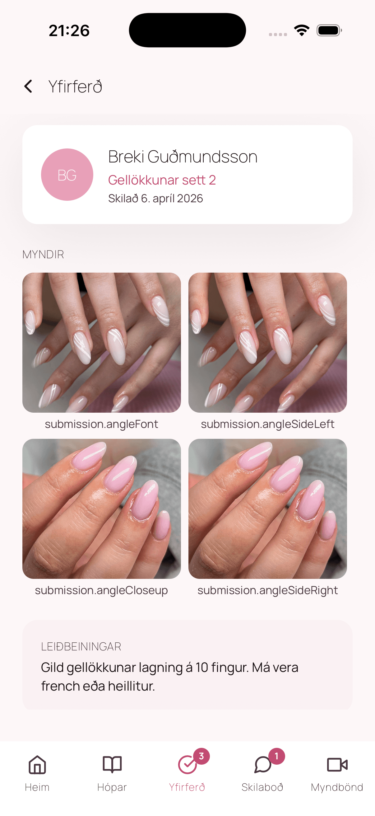 Instructor reviewing a student submission with photos